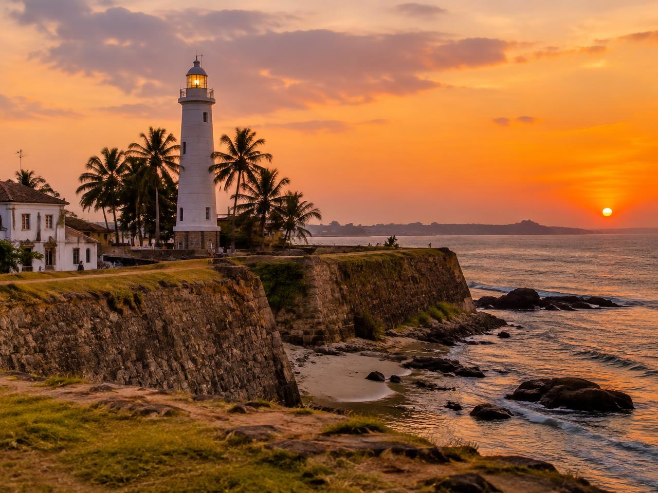 Historic UNESCO Galle Fort lighthouse at sunset